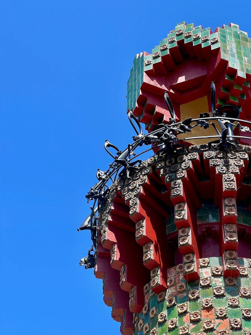 a tall tower with a clock on the top of it