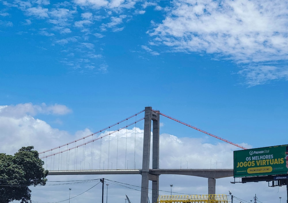 a bridge that has a sign on the side of it