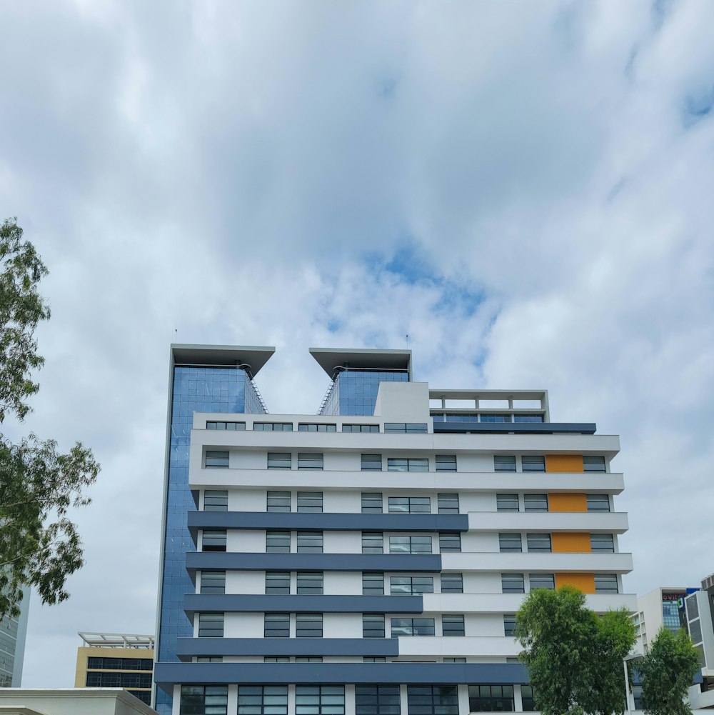 a tall building with a sky background