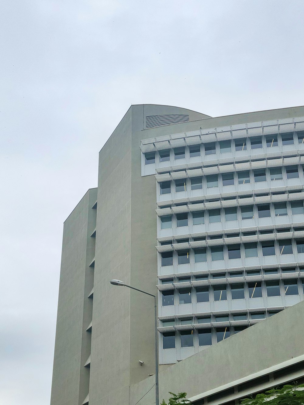 a tall building with a clock on the front of it