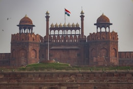 a large building with a flag on top of it