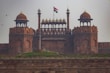 a large building with a flag on top of it