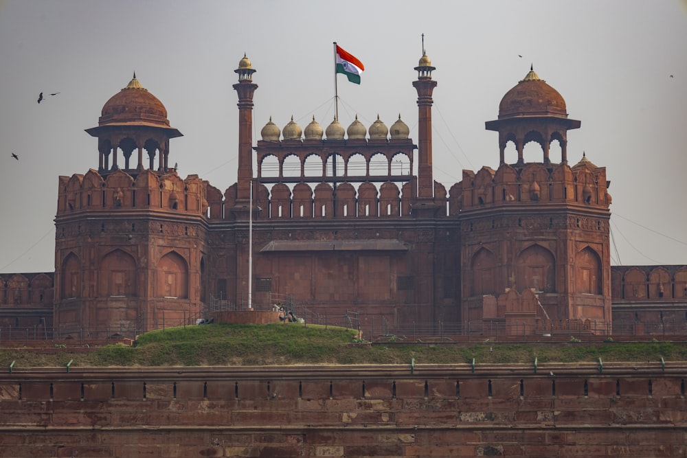 a large building with a flag on top of it