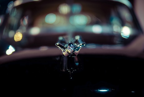 a close up of a car's hood ornament
