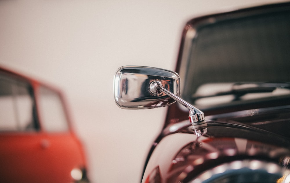 a close up of a mirror on a car