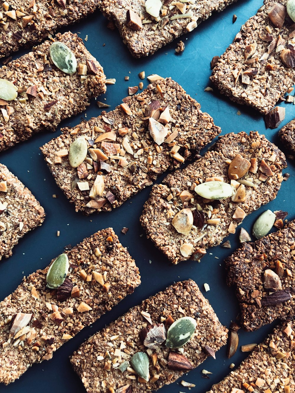 a table topped with lots of granola bars