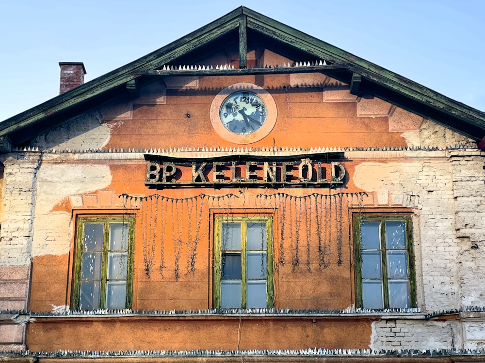 a building with a clock on the front of it