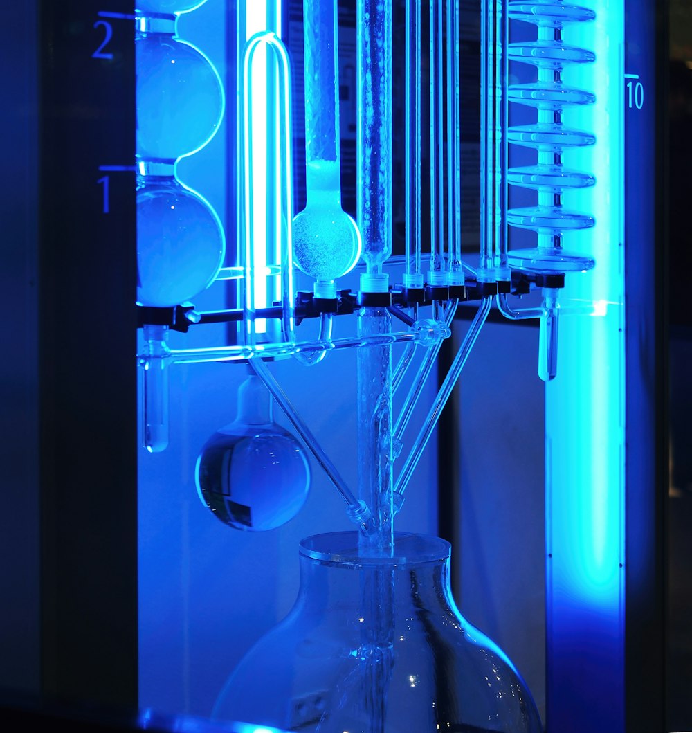 a blue light is shining on a machine