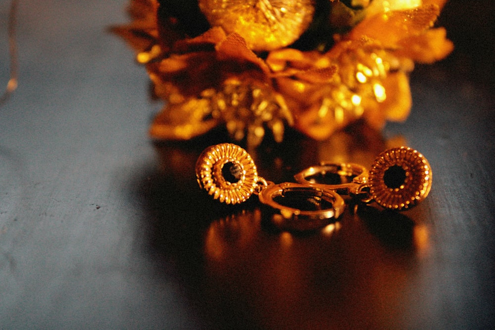 a bouquet of flowers sitting on top of a wooden table