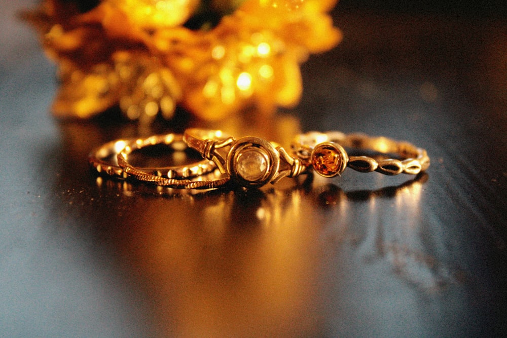 a couple of rings sitting on top of a table