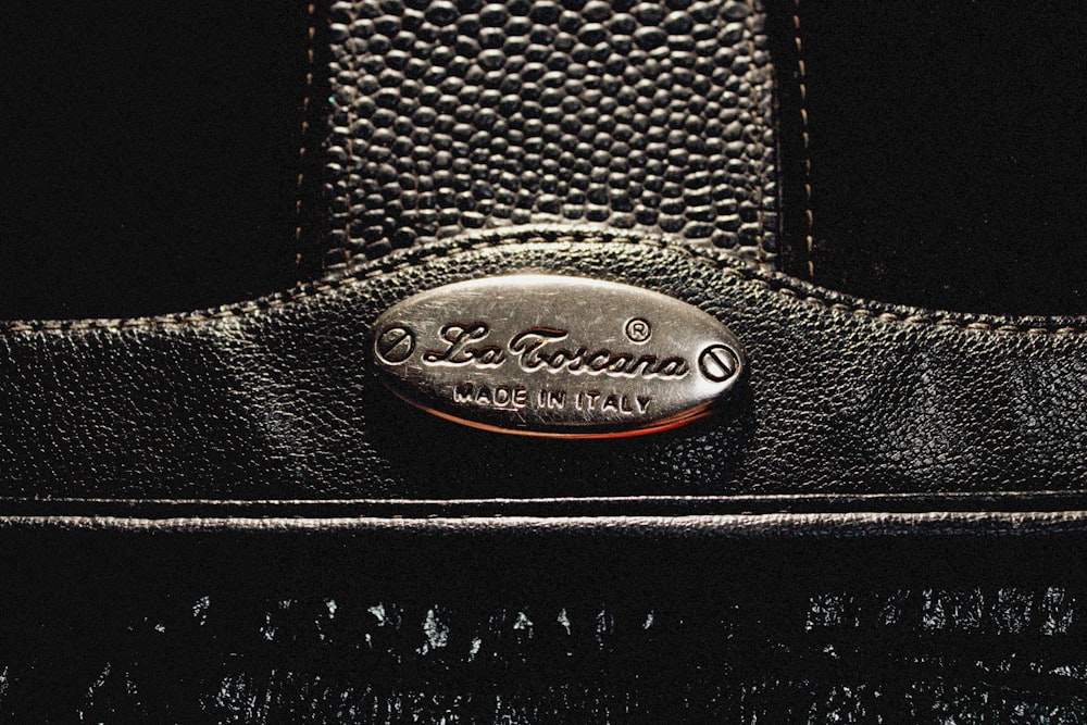 a close up of a black leather bag
