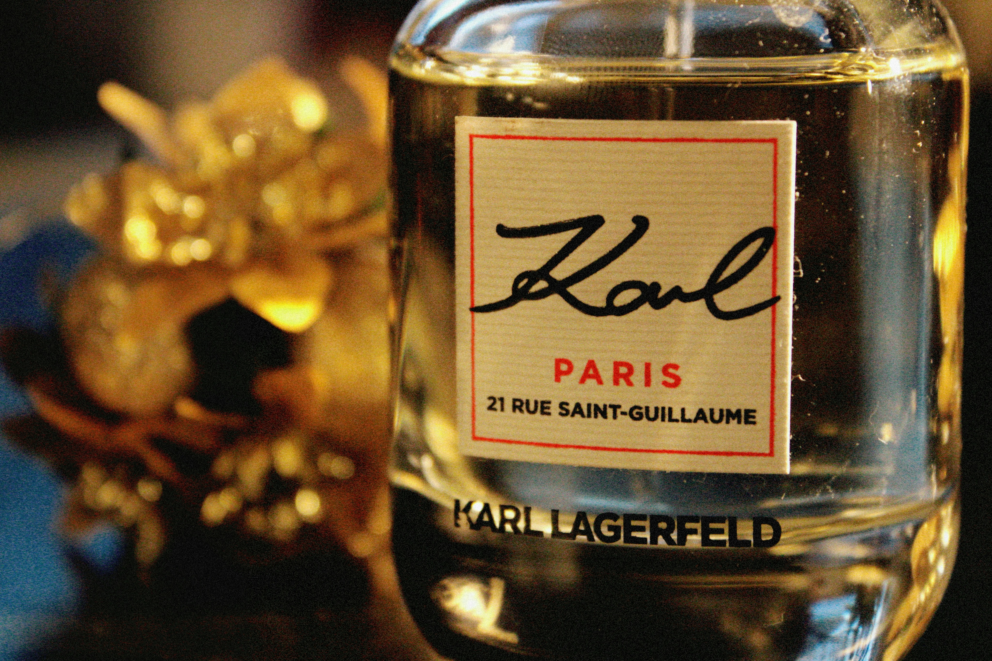 a close up of a bottle of cologne on a table