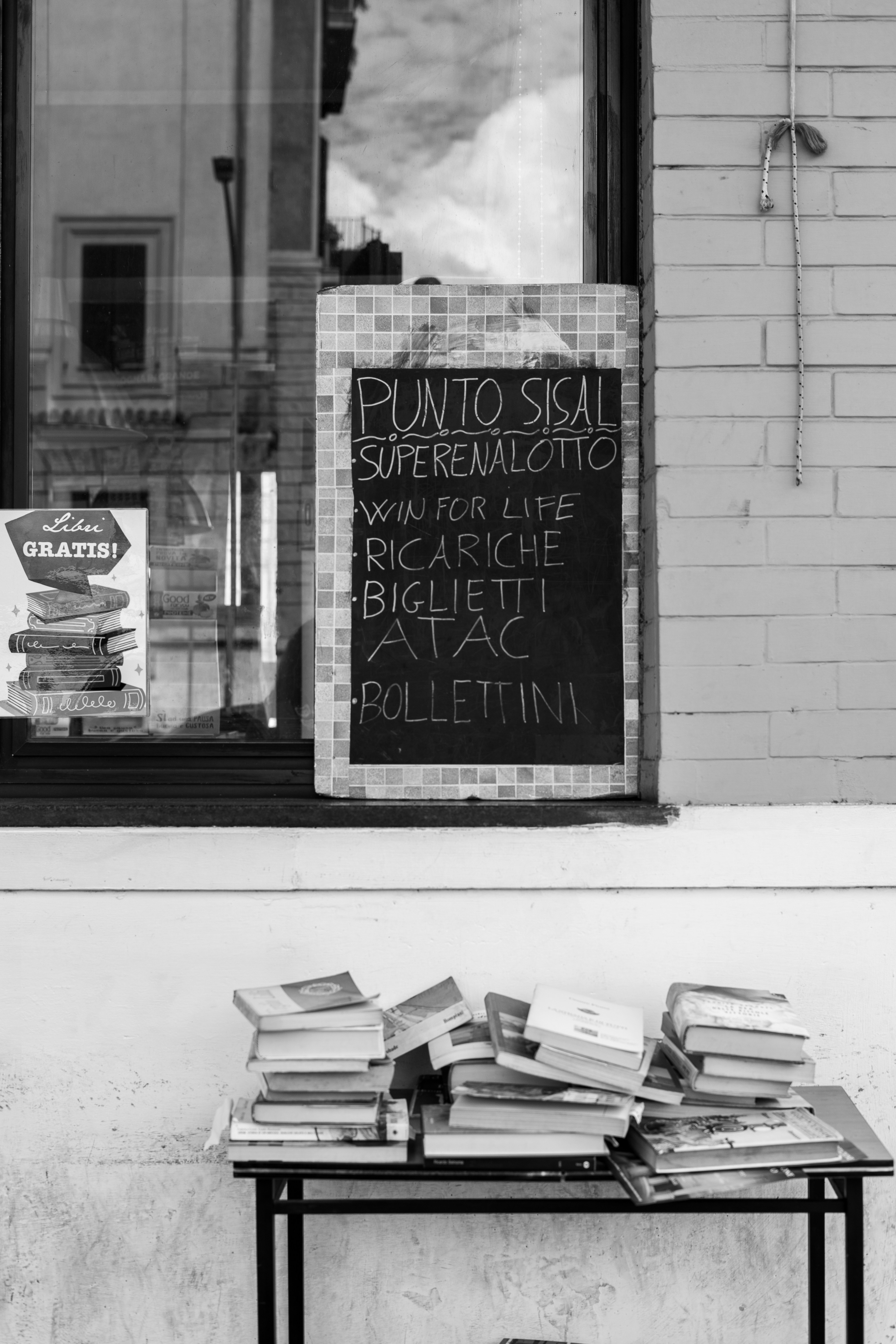 a pile of books sitting on top of a table