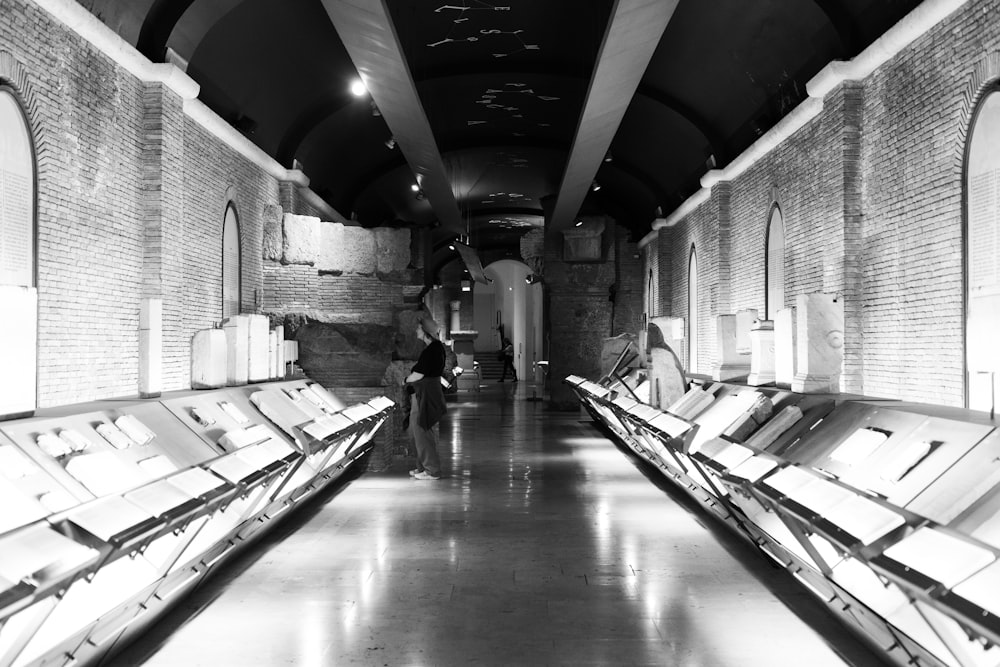 a black and white photo of empty benches