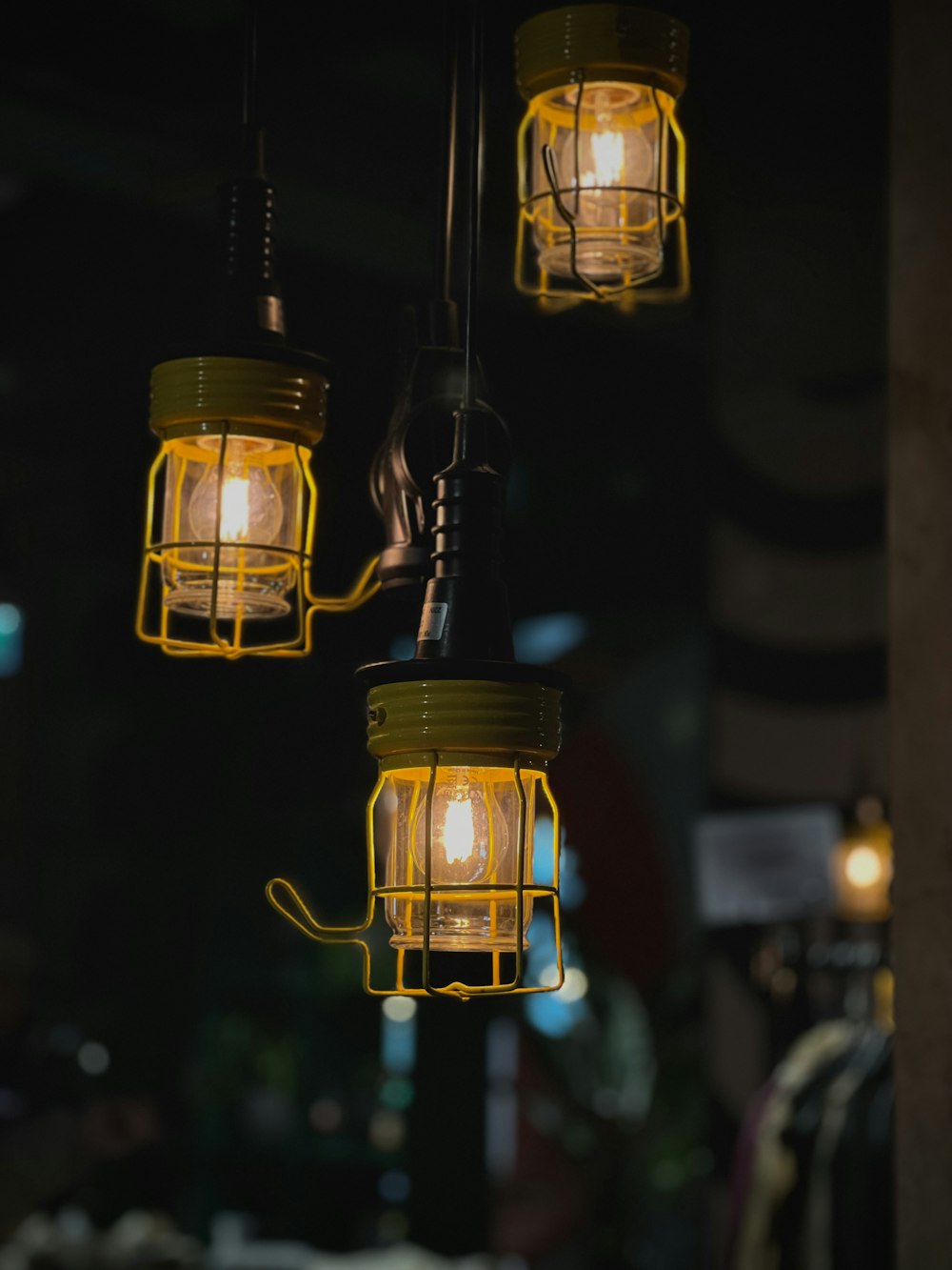 a group of lights hanging from a ceiling