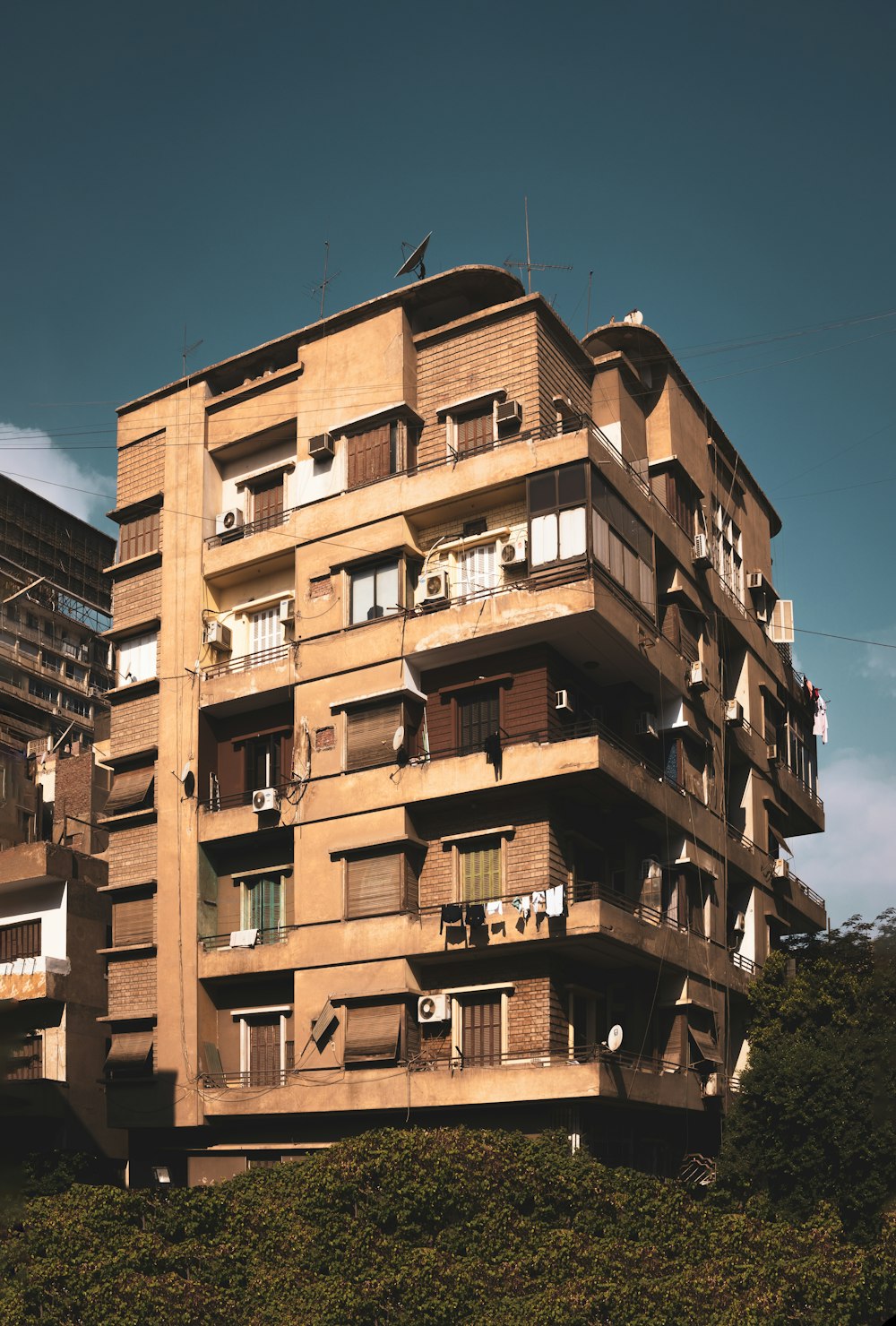 a tall building with balconies and balconies on the balconies