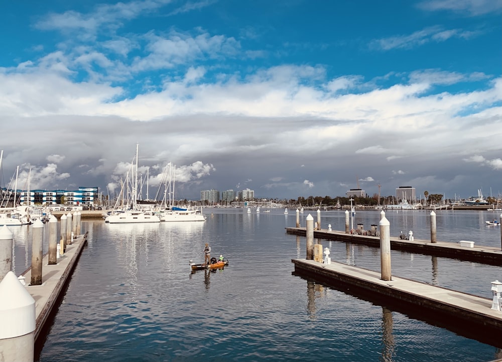 a body of water with a bunch of boats in it