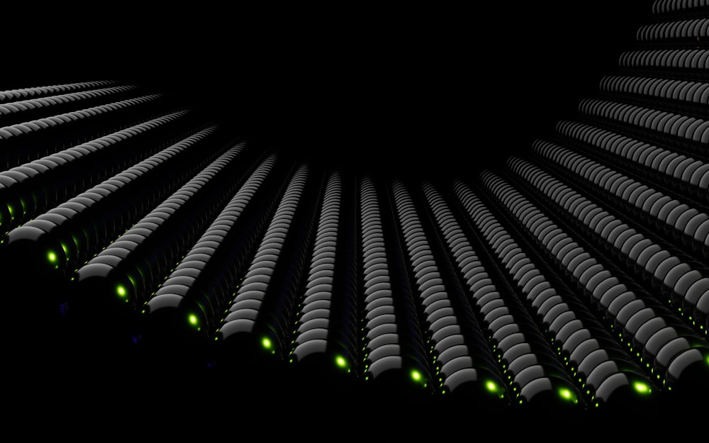 ein schwarzer Hintergrund mit grünen und weißen Lichtern