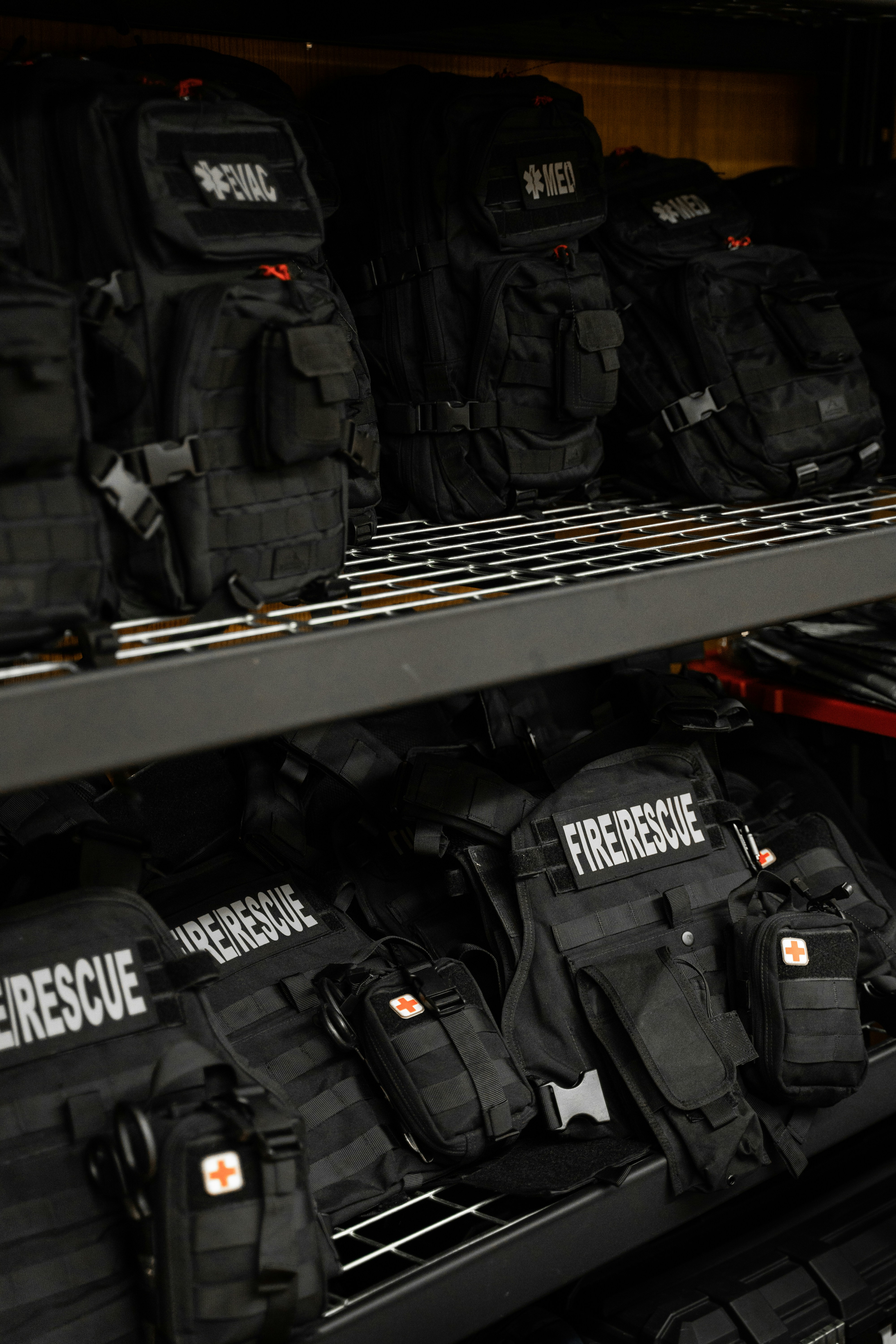 a shelf filled with backpacks in a store