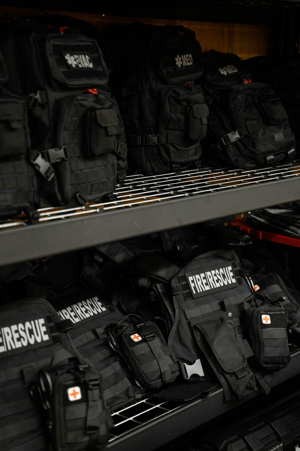 a shelf filled with backpacks in a store