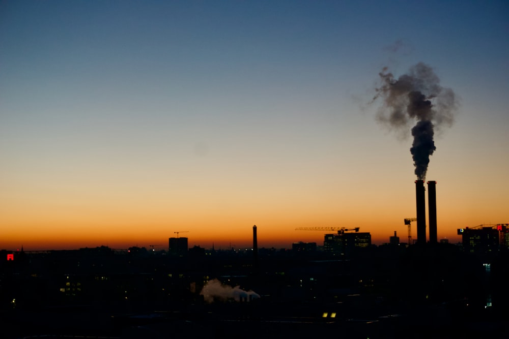 a factory with smoke coming out of it