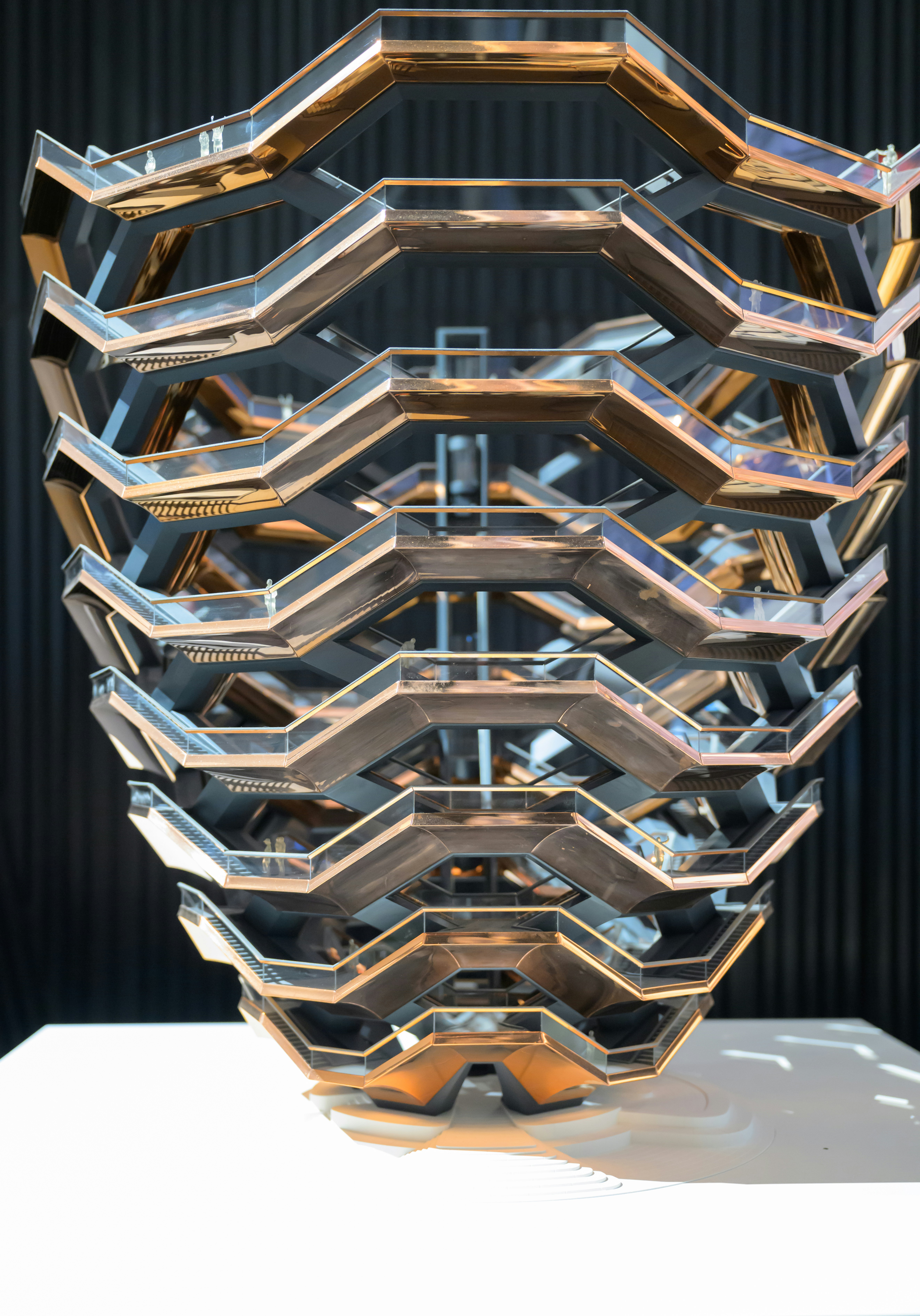 a large metal object sitting on top of a white table