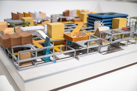 a model of a city with buildings and cars