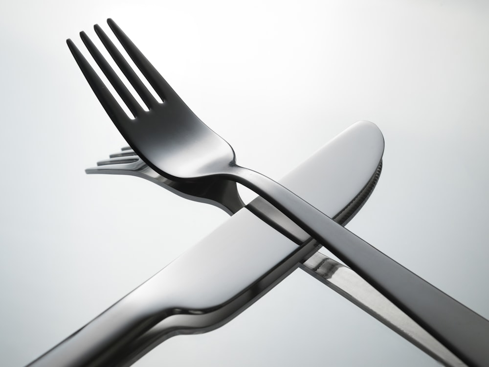 a close up of a fork and a knife