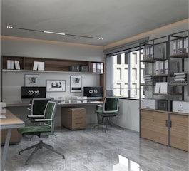 a room with a desk, chairs, shelves and a window