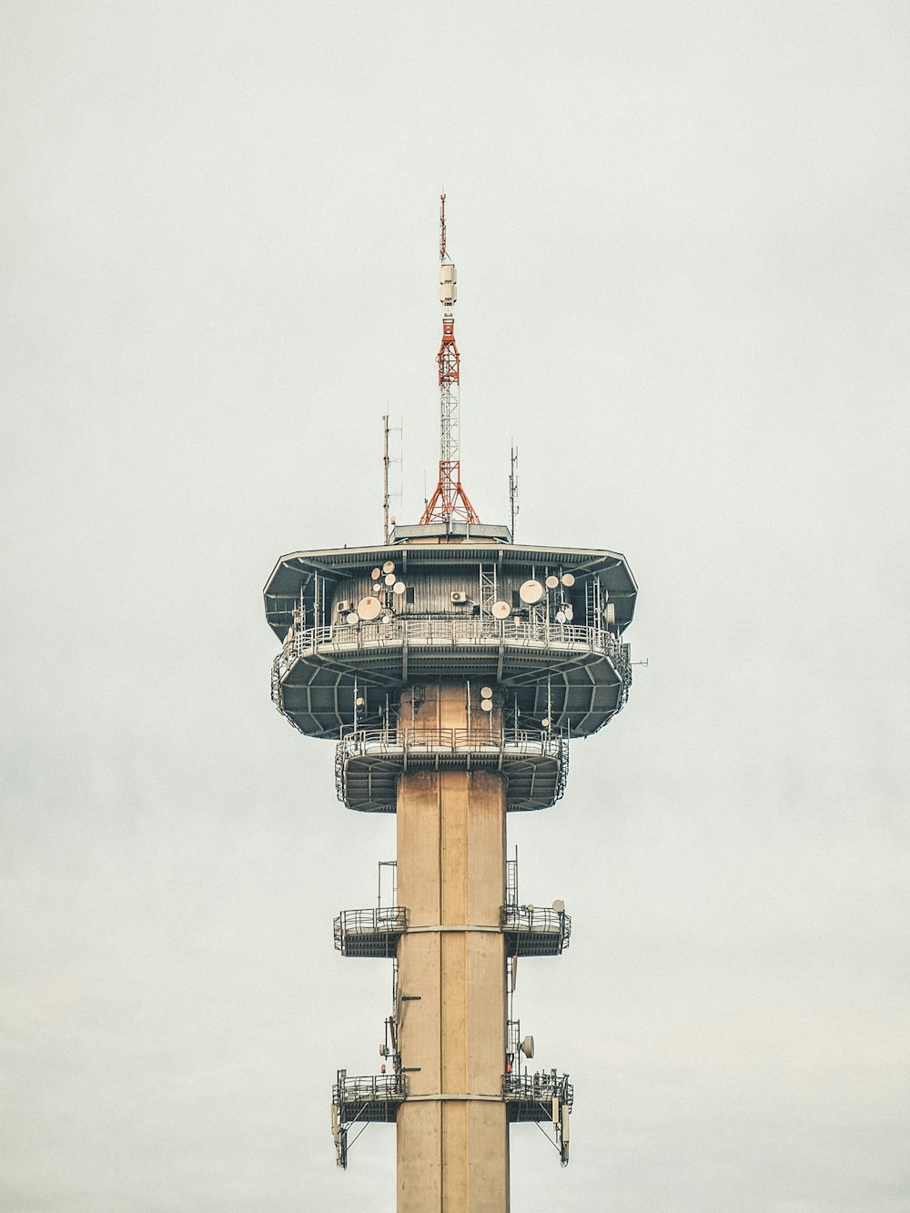 a tall tower with a radio antenna on top of it