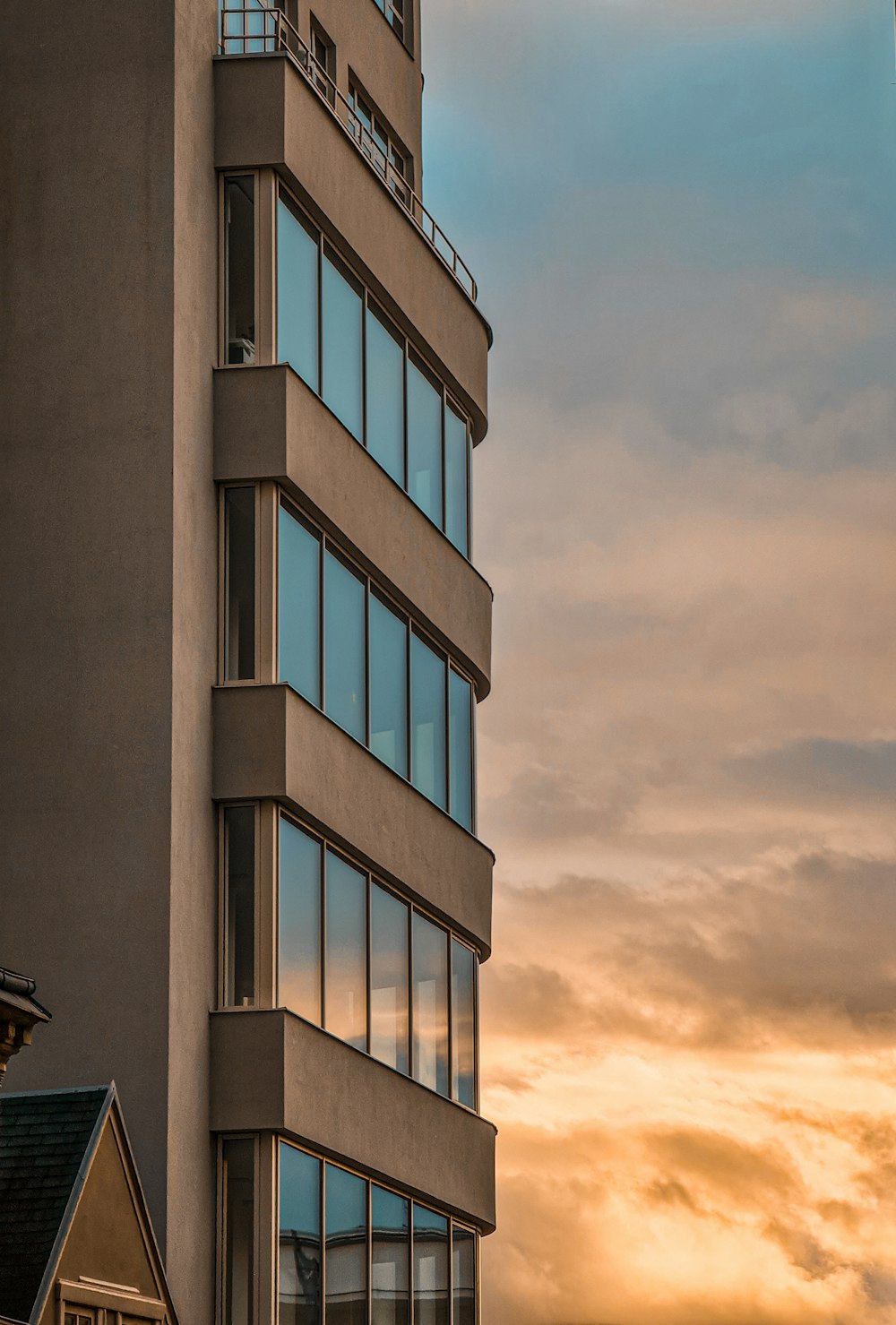 a tall building with a clock on the top of it