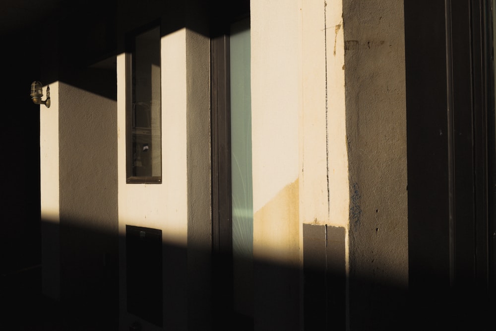 the shadow of a door on a building