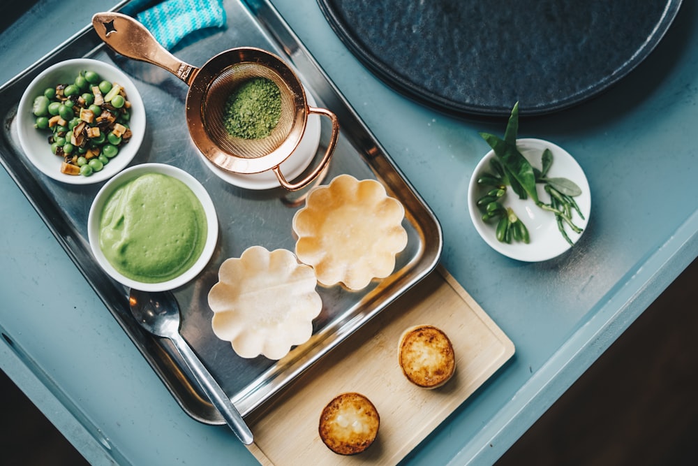 a tray of food on a blue table