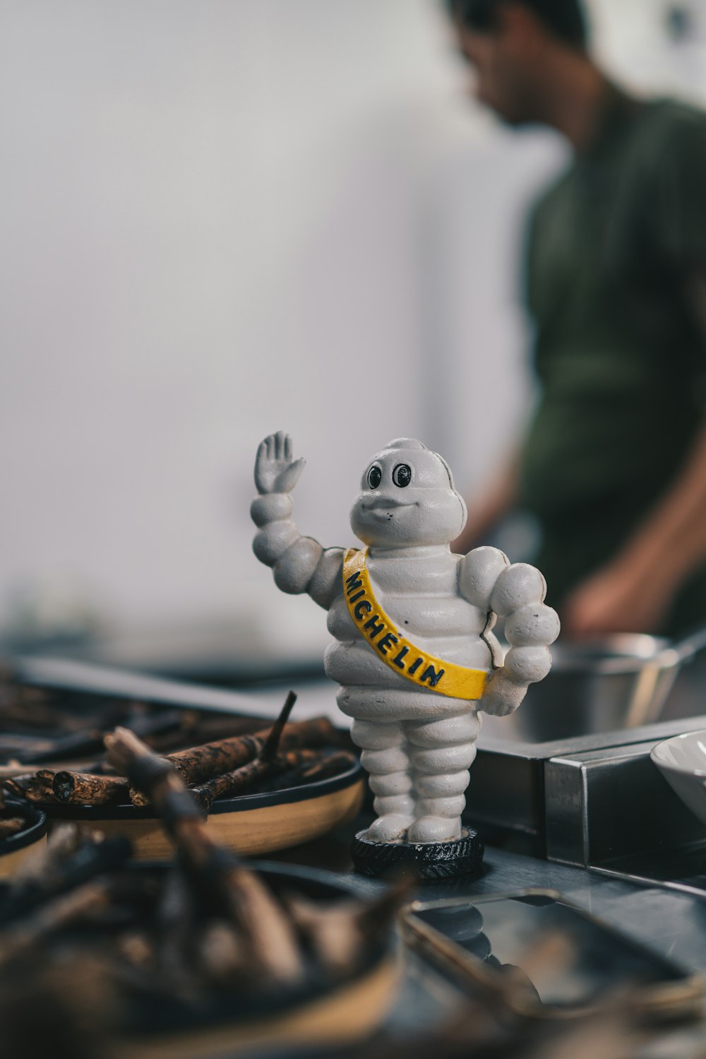 a small plastic figure of a person holding a banana