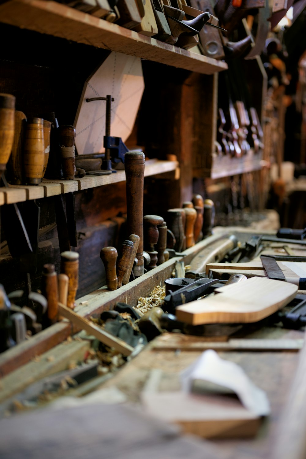 a workbench filled with lots of different types of tools