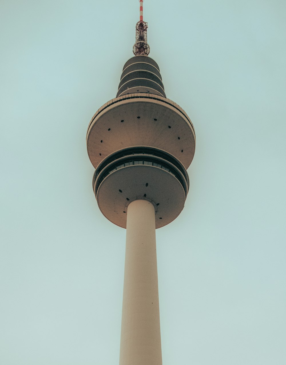 a tall tower with a sky background