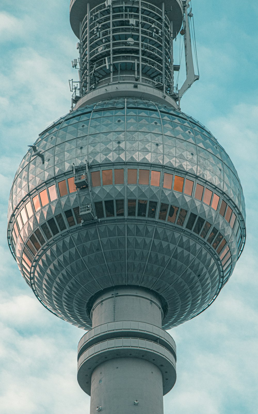 a very tall tower with a sky background