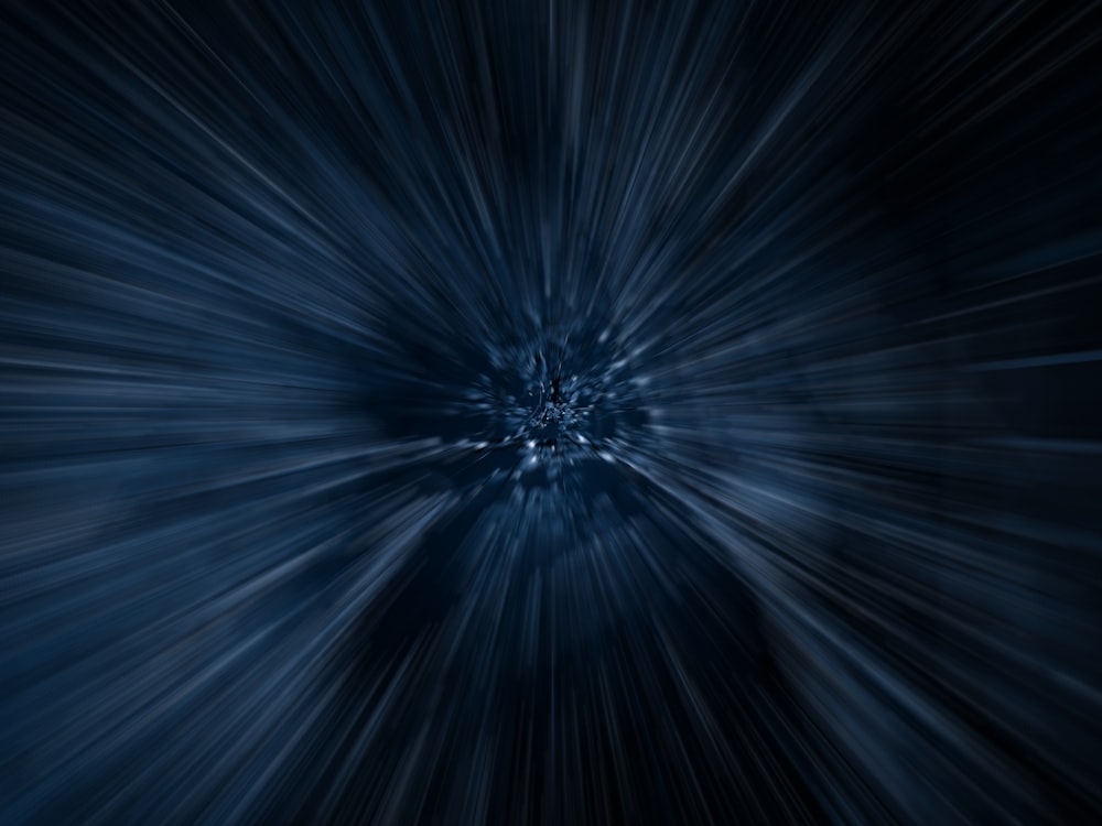 a dark blue background with a star burst