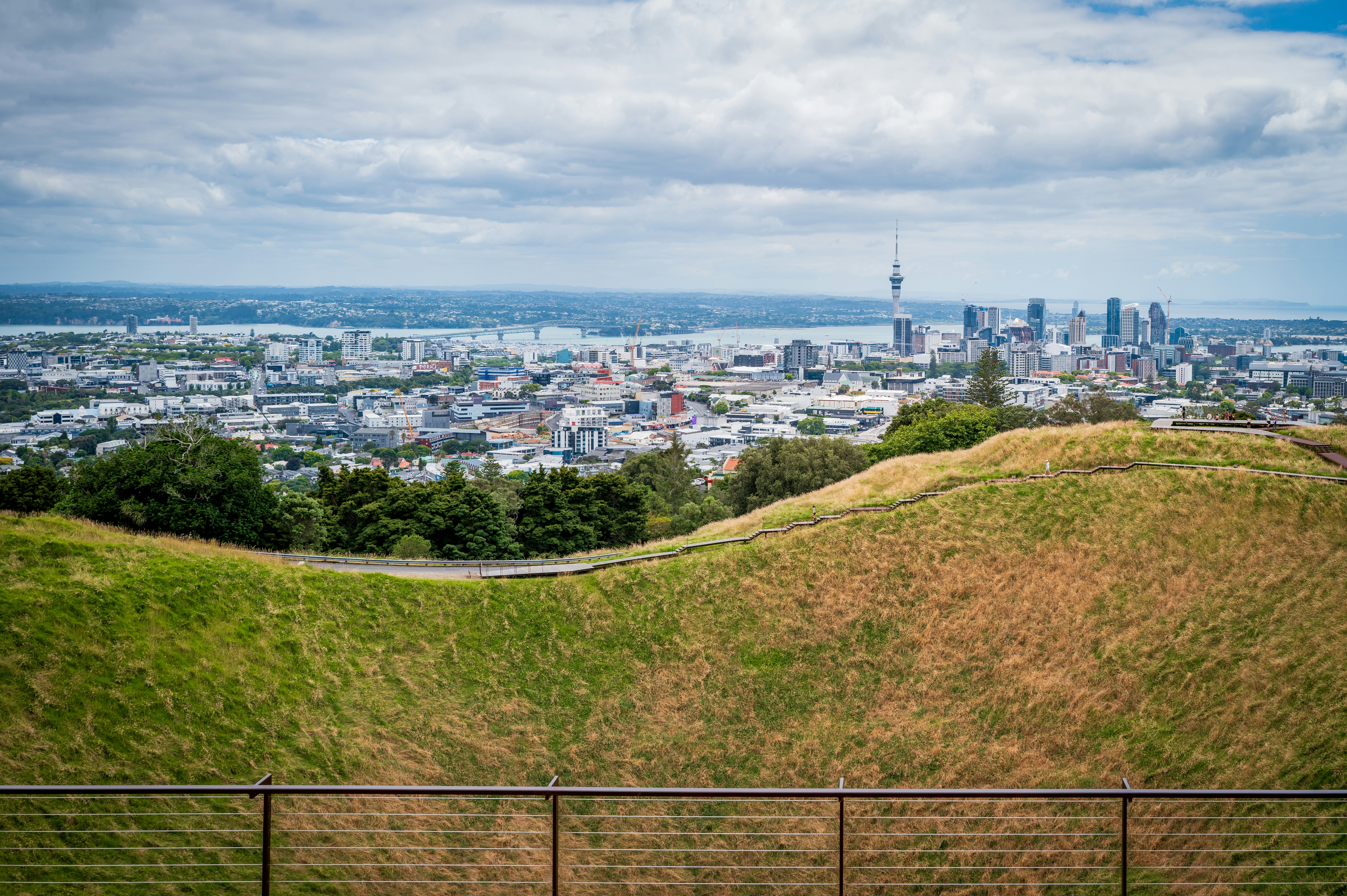 a view of a city from the top of a hill
