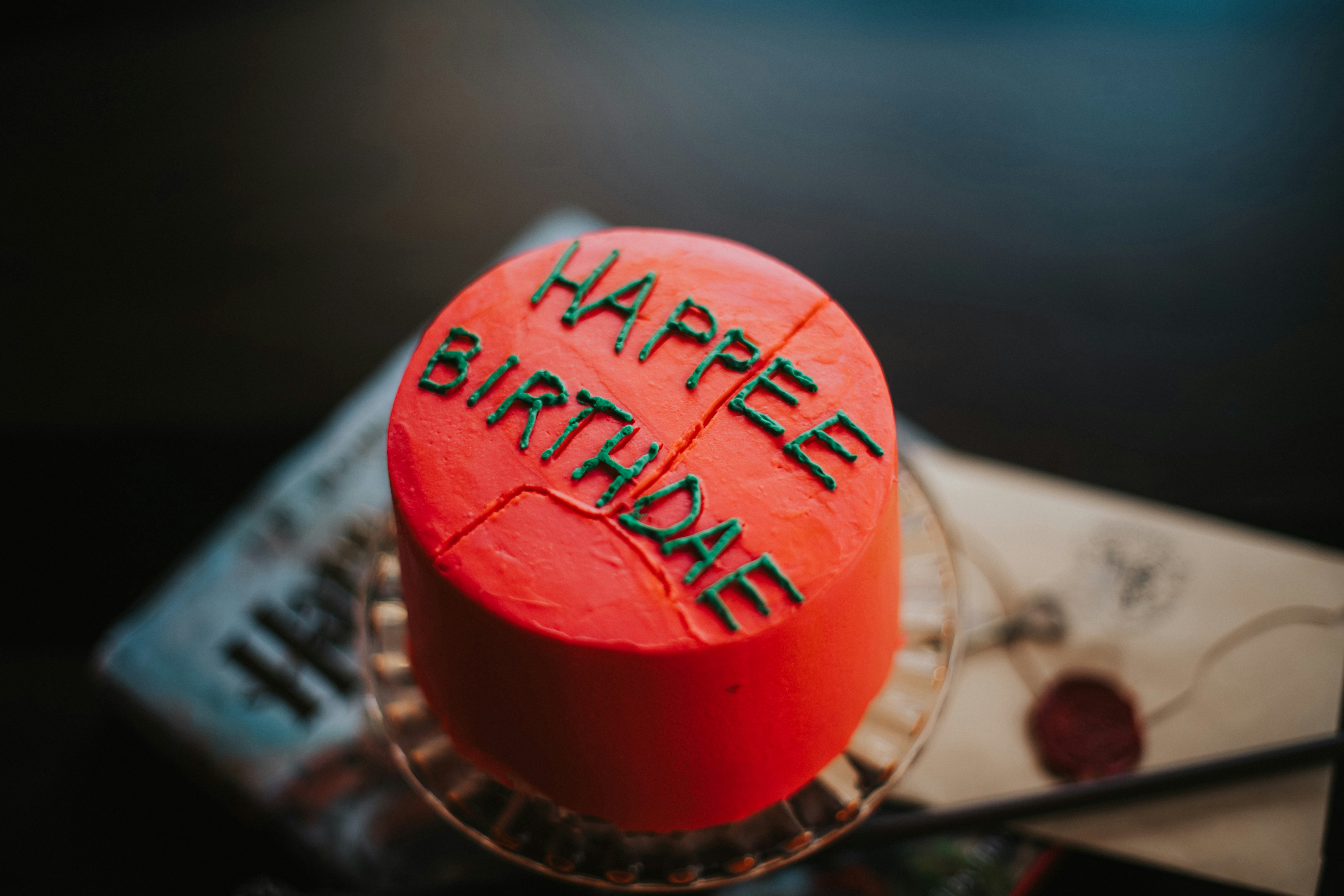 a birthday cake with the words happy birthday written on it