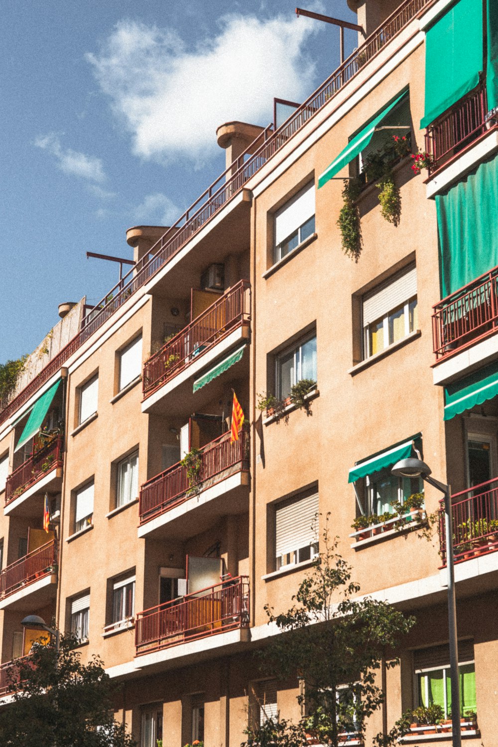 an apartment building with balconies and balconies on the balconies