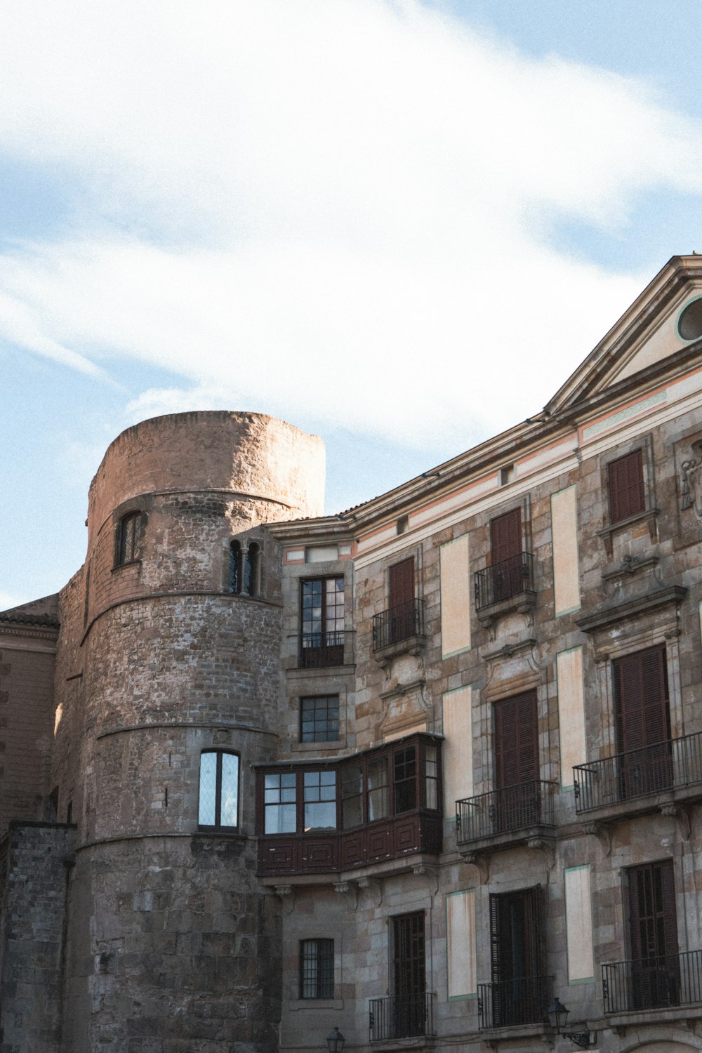 a large building with a clock on the top of it