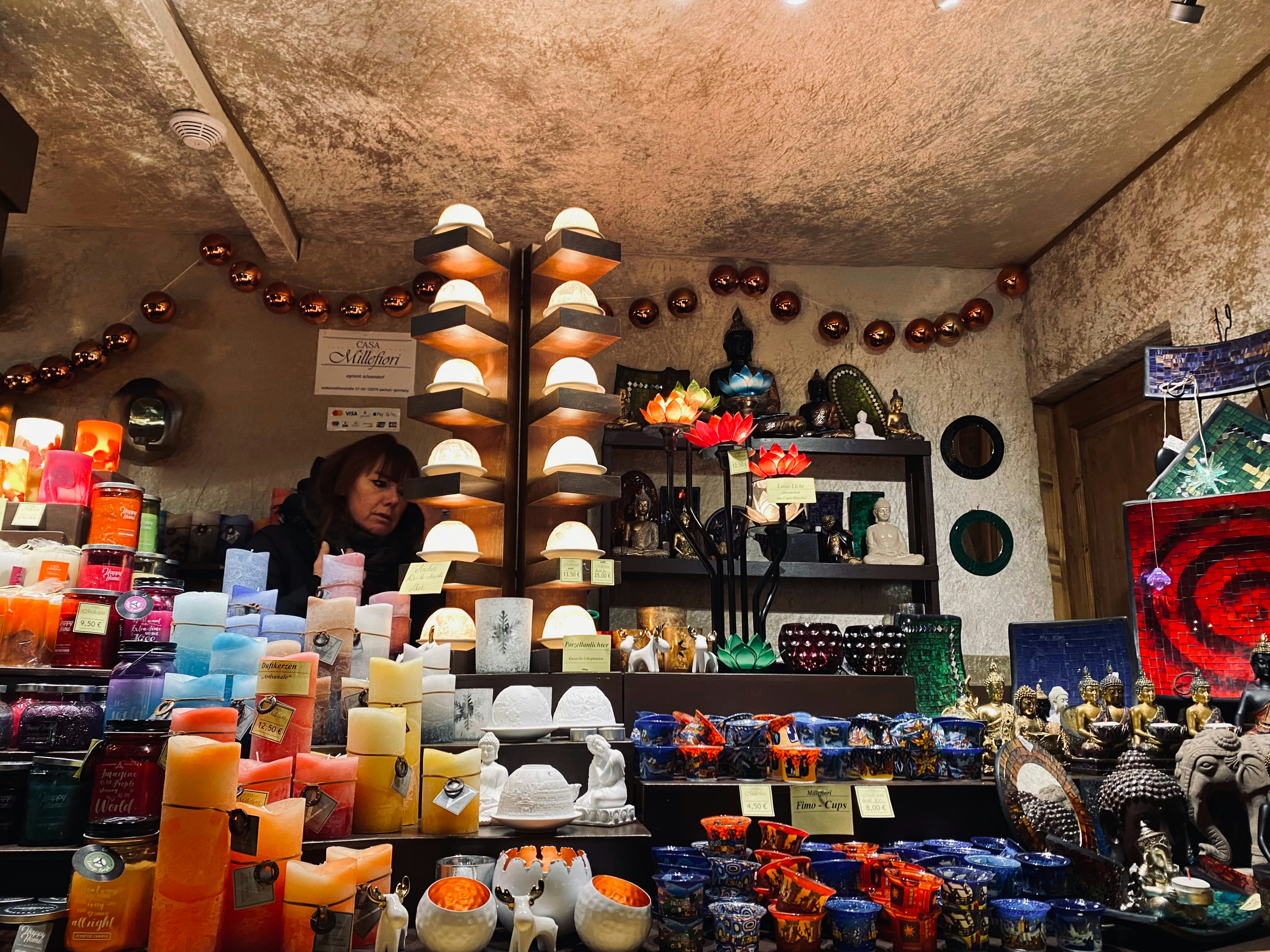 Seasonal souvenir and gift items displayed in colorful arrangement, festive retail atmosphere