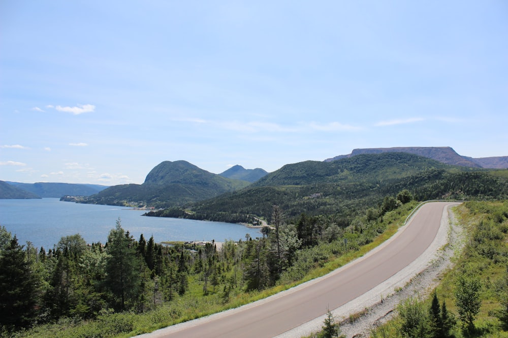 a scenic view of a lake and mountains