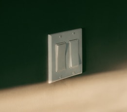 a light switch on a wall in a room