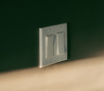 a light switch on a wall in a room