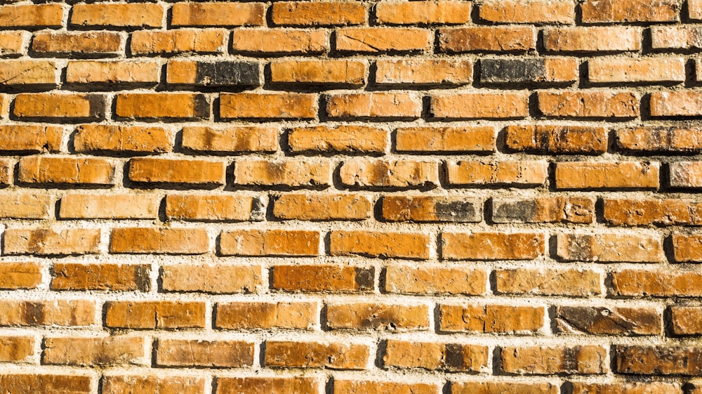 a close up of a brick wall made of bricks