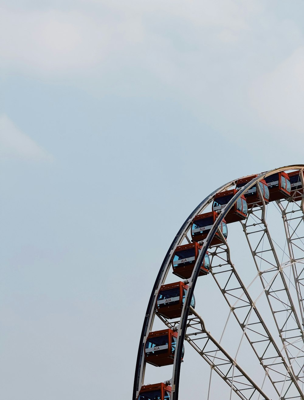 a large ferris wheel on a clear day