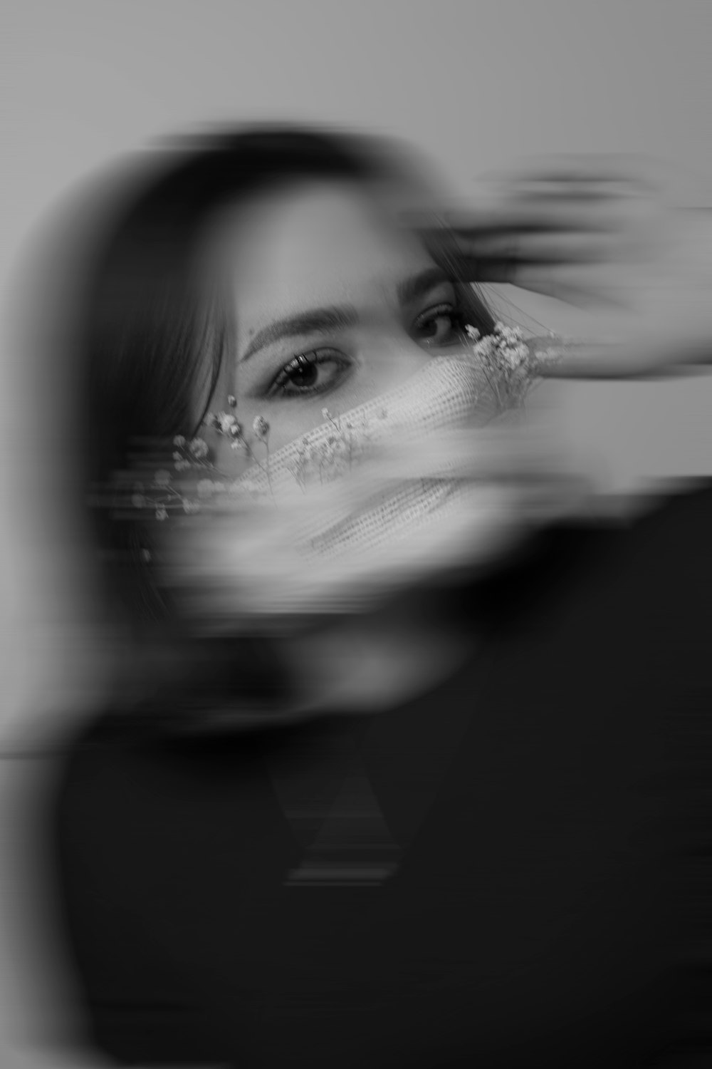 a blurry photo of a woman's face