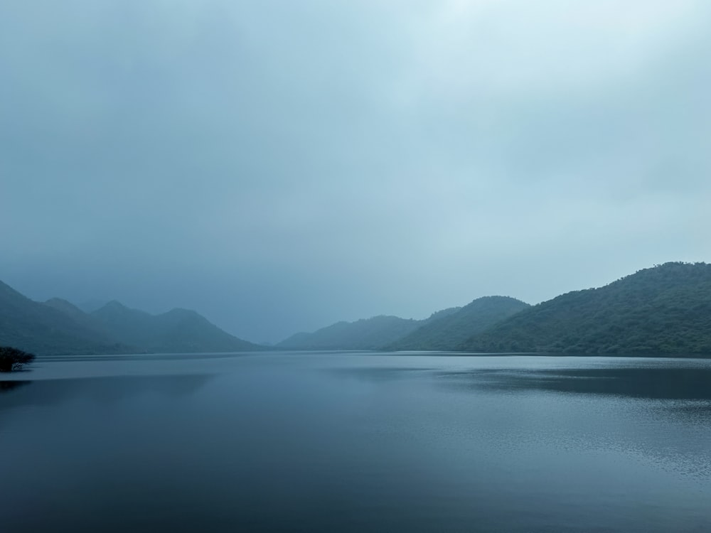 a large body of water surrounded by mountains